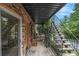 Inviting outdoor patio with brick accents and staircase with space for seating at 1225 Church St # A, Decatur, GA 30030