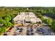 Aerial view shows a large YMCA facility with ample parking, convenient access to recreation and play spaces at 1585 San Gabriel Ave, Decatur, GA 30032