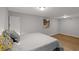 Bedroom boasts ample space, neutral decor, and plush bedding, creating a serene and welcoming retreat at 1585 San Gabriel Ave, Decatur, GA 30032