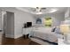 Stylish bedroom showcasing a window view, a dresser, and a comfy bed at 1585 San Gabriel Ave, Decatur, GA 30032