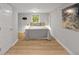 Cozy bedroom features neutral walls, stylish decor, and great natural light with a spacious and inviting atmosphere at 1585 San Gabriel Ave, Decatur, GA 30032