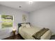 Sunlit bedroom boasting a window view and a cozy, inviting atmosphere at 1585 San Gabriel Ave, Decatur, GA 30032