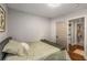 Charming bedroom with a glimpse of laundry and bathroom amenities at 1585 San Gabriel Ave, Decatur, GA 30032
