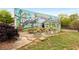 Outdoor seating near a local mural enhances the community feel of this real estate at 1585 San Gabriel Ave, Decatur, GA 30032
