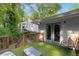 Outdoor deck area featuring artificial grass and serene backyard views at 1585 San Gabriel Ave, Decatur, GA 30032