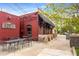 Exterior of Steinbeck's with patio seating at 1585 San Gabriel Ave, Decatur, GA 30032