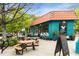 The Oakview Coffee building featuring picnic table seating and an outside chalkboard menu at 1585 San Gabriel Ave, Decatur, GA 30032