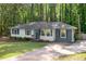 Charming home with well-manicured lawn and mature trees at 1585 San Gabriel Ave, Decatur, GA 30032