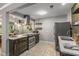 Modern kitchen featuring stainless steel appliances, stone countertops, and patterned floors at 1585 San Gabriel Ave, Decatur, GA 30032