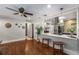Bright kitchen with dine-in bar, stainless appliances, and hardwood floors at 1585 San Gabriel Ave, Decatur, GA 30032