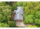 Aerial view showcasing the home's roof and surrounding trees at 2144 Lamplight Dr, Marietta, GA 30062