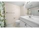 Bathroom with shower/tub combo, and a white toilet and vanity at 2144 Lamplight Dr, Marietta, GA 30062