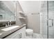 Updated bathroom with elegant fixtures, marble backsplash, and glass-enclosed shower at 2144 Lamplight Dr, Marietta, GA 30062