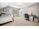 Carpeted bedroom featuring sloped ceilings, a desk, a bed, and a window at 2144 Lamplight Dr, Marietta, GA 30062