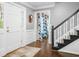 Elegant foyer with hardwood floors, staircase, and a view into adjoining rooms enhancing its appeal at 2144 Lamplight Dr, Marietta, GA 30062