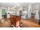 Bright kitchen with stainless steel appliances, custom cabinets, hardwood floors, and large central island at 2144 Lamplight Dr, Marietta, GA 30062