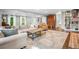 Bright and open living room with hardwood floors, fireplace, and plenty of seating perfect for entertaining at 2144 Lamplight Dr, Marietta, GA 30062