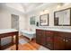 Elegant main bathroom featuring double vanity, clawfoot tub, and separate walk-in shower at 2144 Lamplight Dr, Marietta, GA 30062