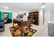 Home office with hardwood desk, floral rug, and lots of room for storage at 2144 Lamplight Dr, Marietta, GA 30062