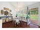 Charming dining space with a door that leads to the outdoor patio at 5042 Southland Dr, Woodstock, GA 30188