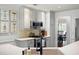 Modern kitchen with stainless steel appliances and a view of the dining area at 5042 Southland Dr, Woodstock, GA 30188