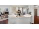 Well-lit kitchen with stainless steel appliances and an open view to the living area at 5042 Southland Dr, Woodstock, GA 30188