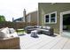 An inviting backyard patio offers ample seating and space for outdoor activities and entertaining at 6030 Pattingham Dr, Roswell, GA 30075