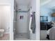 Walk-in shower with glass door is conveniently located next to the primary bedroom at 6030 Pattingham Dr, Roswell, GA 30075