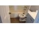Small bathroom featuring neutral tones and a classic tub and shower combination at 1131 Indale Sw Pl, Atlanta, GA 30310