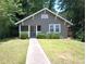 Charming single-story home with a well-maintained front yard and inviting porch at 1131 Indale Sw Pl, Atlanta, GA 30310