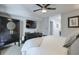 Bedroom featuring ceiling fan, dresser and large armoire at 1418 Summit North Ne Dr # 1418, Atlanta, GA 30324