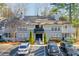Exterior of a two-story condominium complex with well-maintained landscaping and ample parking at 1418 Summit North Ne Dr # 1418, Atlanta, GA 30324
