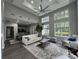 Bright living room with high ceilings, large windows, and modern decor at 1418 Summit North Ne Dr # 1418, Atlanta, GA 30324