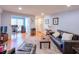 Bright living room with hardwood floors and open layout to workspace at 1418 Summit North Ne Dr # 1418, Atlanta, GA 30324
