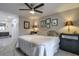 Comfortable main bedroom with a ceiling fan and ensuite bathroom featuring modern gray vanity and tile flooring at 1418 Summit North Ne Dr # 1418, Atlanta, GA 30324