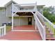 Spacious back deck with stairs and railing, perfect for outdoor entertaining and relaxation at 3342 Windpointe Ct, Buford, GA 30519