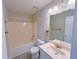 Bathroom featuring a tub and shower combination, light vanity, and toilet at 3342 Windpointe Ct, Buford, GA 30519