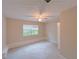 Bedroom with window seat and neutral carpet, paint, and window shades at 3342 Windpointe Ct, Buford, GA 30519