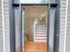 Inviting entryway showcasing hardwood floors, stairs to the upper level, and ample natural light at 3342 Windpointe Ct, Buford, GA 30519