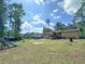 Wide view of backyard, with play structure and plenty of space for activities at 3814 Lamar Way, Snellville, GA 30039