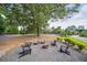 Community fire pit area with seating, providing a relaxing outdoor space at 5475 Copper Creek Pass, Cumming, GA 30040
