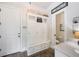 Bright mudroom features built-in storage cabinets and direct access to bathroom at 5475 Copper Creek Pass, Cumming, GA 30040