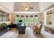 Spacious home office with multiple workstations, built-in shelving, and great natural light at 5475 Copper Creek Pass, Cumming, GA 30040