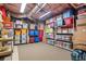Organized storage room with shelves filled with labeled bins and containers, maximizing space and accessibility at 5475 Copper Creek Pass, Cumming, GA 30040