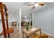 Open basement design with office area and seating arrangement, plus access to outdoor spaces at 203 Concorde Sw Way, Lilburn, GA 30047