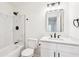 Updated bathroom features a modern vanity, new toilet, and a tiled shower-tub combo at 250 Huntcliff Ct, Fayetteville, GA 30214