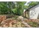 The exterior features a well-maintained yard and a light neutral-colored siding at 250 Huntcliff Ct, Fayetteville, GA 30214