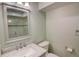 Updated bathroom with a marble countertop vanity and modern fixtures and finishes at 3115 Peachtree Ne Dr, Atlanta, GA 30305