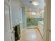 Modern bathroom showcasing a glass shower with decorative tile and granite countertop at 3115 Peachtree Ne Dr, Atlanta, GA 30305