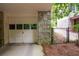Spacious two-car garage with lush surroundings and privacy fence at 3115 Peachtree Ne Dr, Atlanta, GA 30305